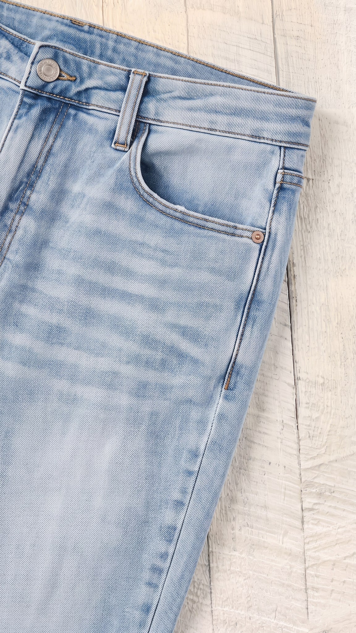 High Waist Tummy Control Vintage Wash Side Slit Slim Boot — Front pocket detail