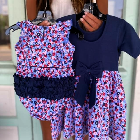 Girls' navy and floral print dresses at Rachel's Rustic Room & Boutique