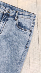 High Waist Stone Wash Straight Fit — Front pocket detail