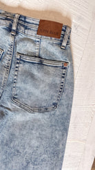 Judy Blue High Waisted Marlow Arc Leg Double Waistband Jeans | Light — Back pocket detail