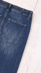 Risen Mid Rise Stretchy Wide Leg Jeans | Dark — Back pocket detail