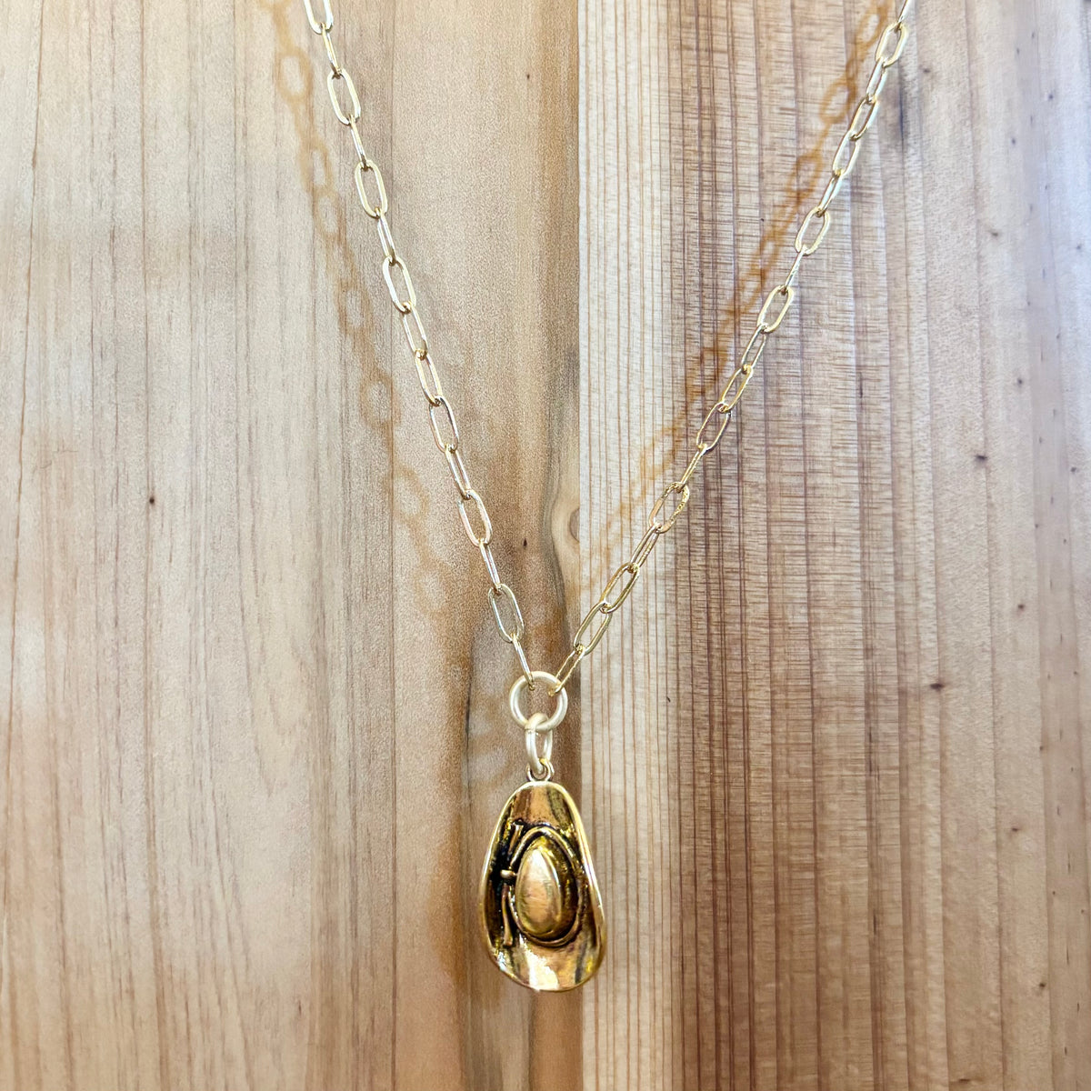 Gold chain necklace with cowboy hat pendant