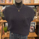 Navy short-sleeve knit sweater top with pocket on mannequin