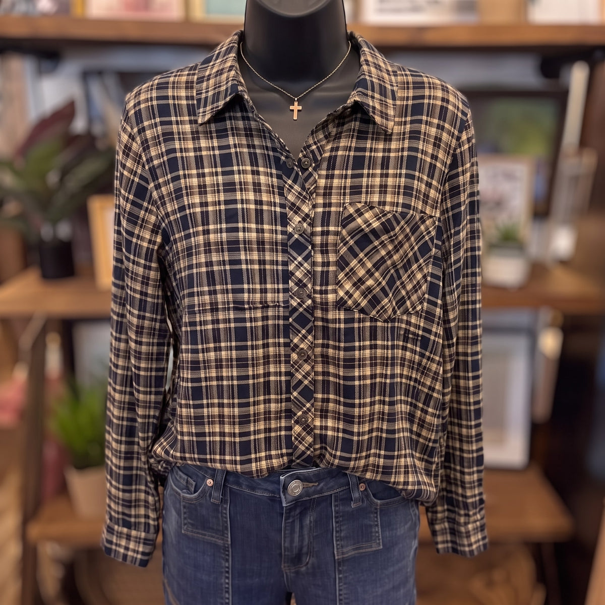 Be Cool Plaid Flannel Shirt in indigo and tan plaid on a mannequin, front view with bias-cut placket and chest pocket